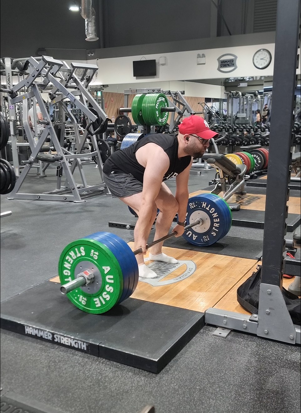 Joseph Bitar practising a barbell deadlift in the gym