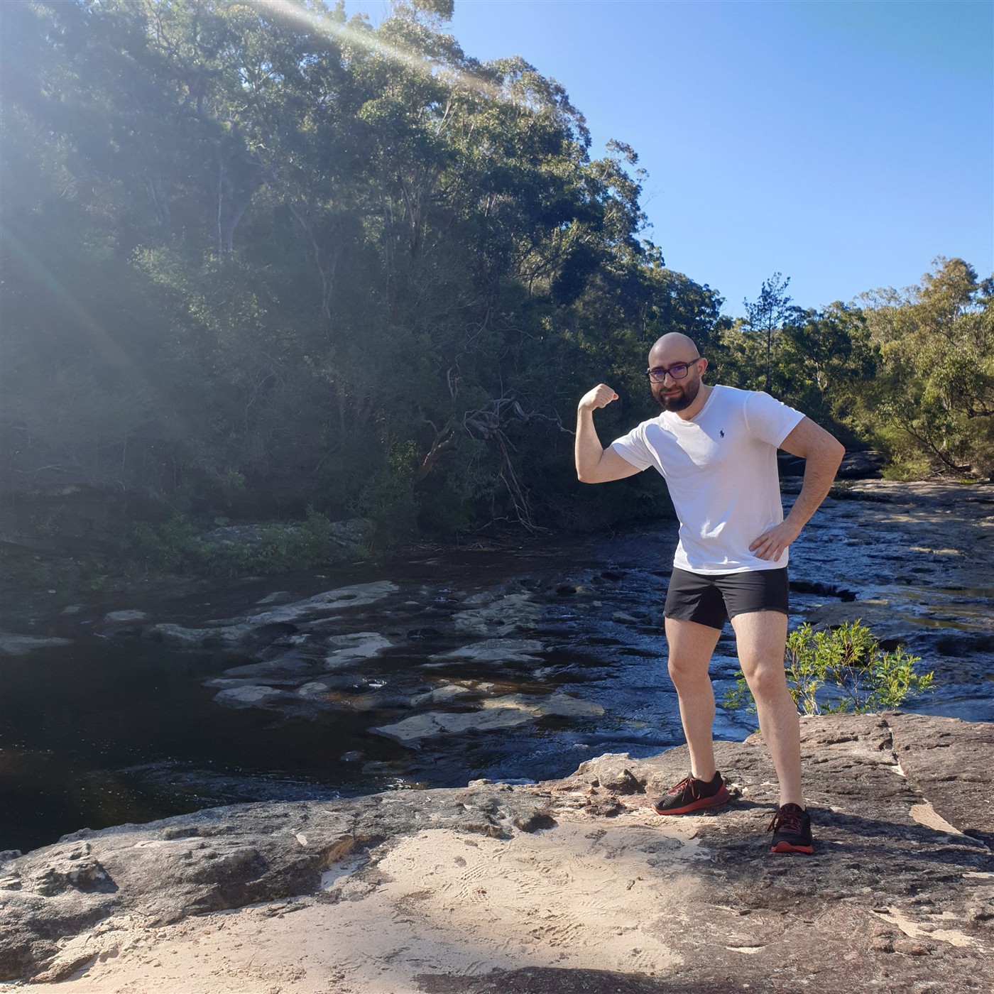 Joseph enjoying time outdoors beside a creek